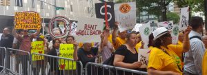 Crowd of people protesting for affordable housing