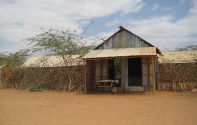Metal shack style building in an arid location