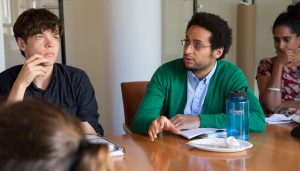 Gallatin Masters student Luis Aguasviva asks discusses colonialism and housing policy with Peter Moskowitz